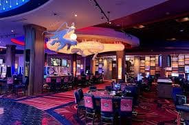 Tangkapan layar aplikasi stellaron menampilkan menu permainan slot dan opsi sportsbook